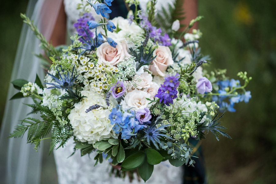 blue, lavender, and white bridal bouquet